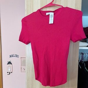 Aritzia Babaton Top - size small color pink